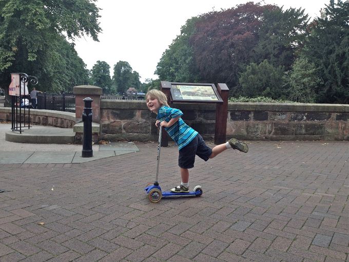 Laurence Rowe Scooting Down Dam Street