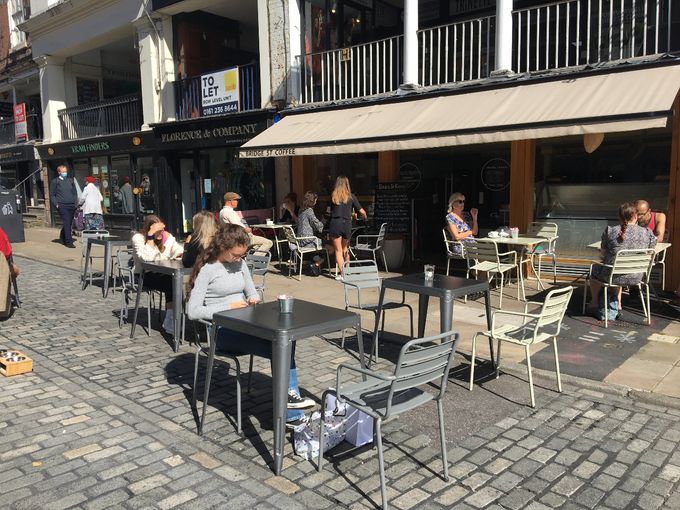 Cafe Society. At an appropriate distance of course.